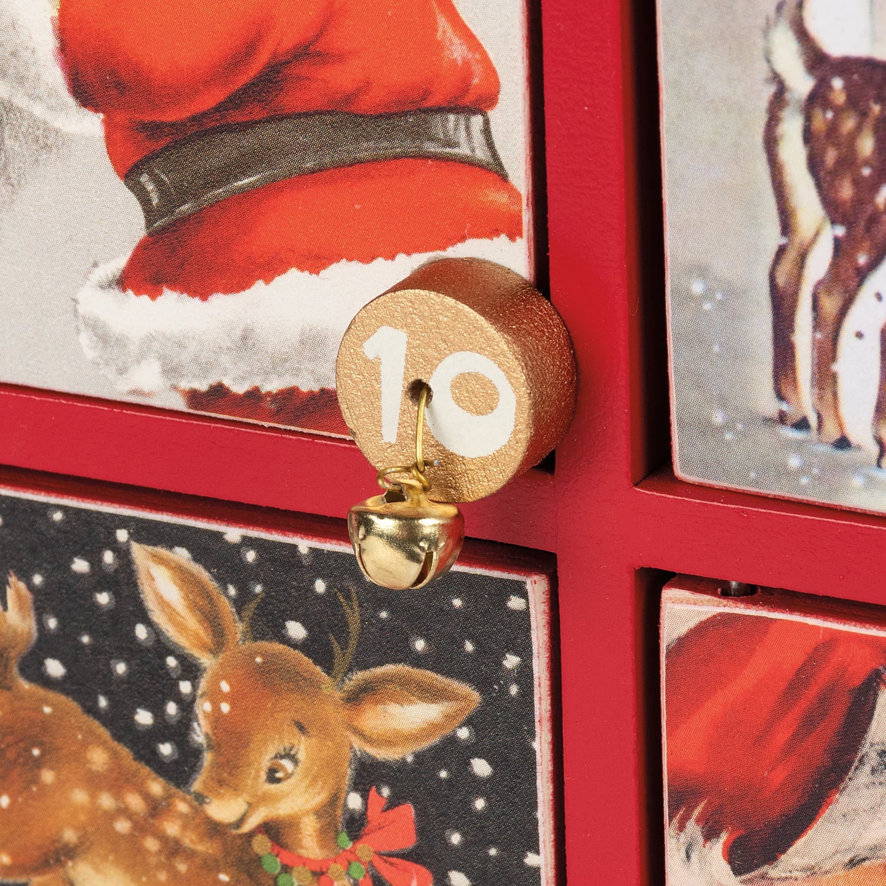 A golden wooden number 10 charm with brass bell from retro santa claus countdown box merry christmas countdown ornament