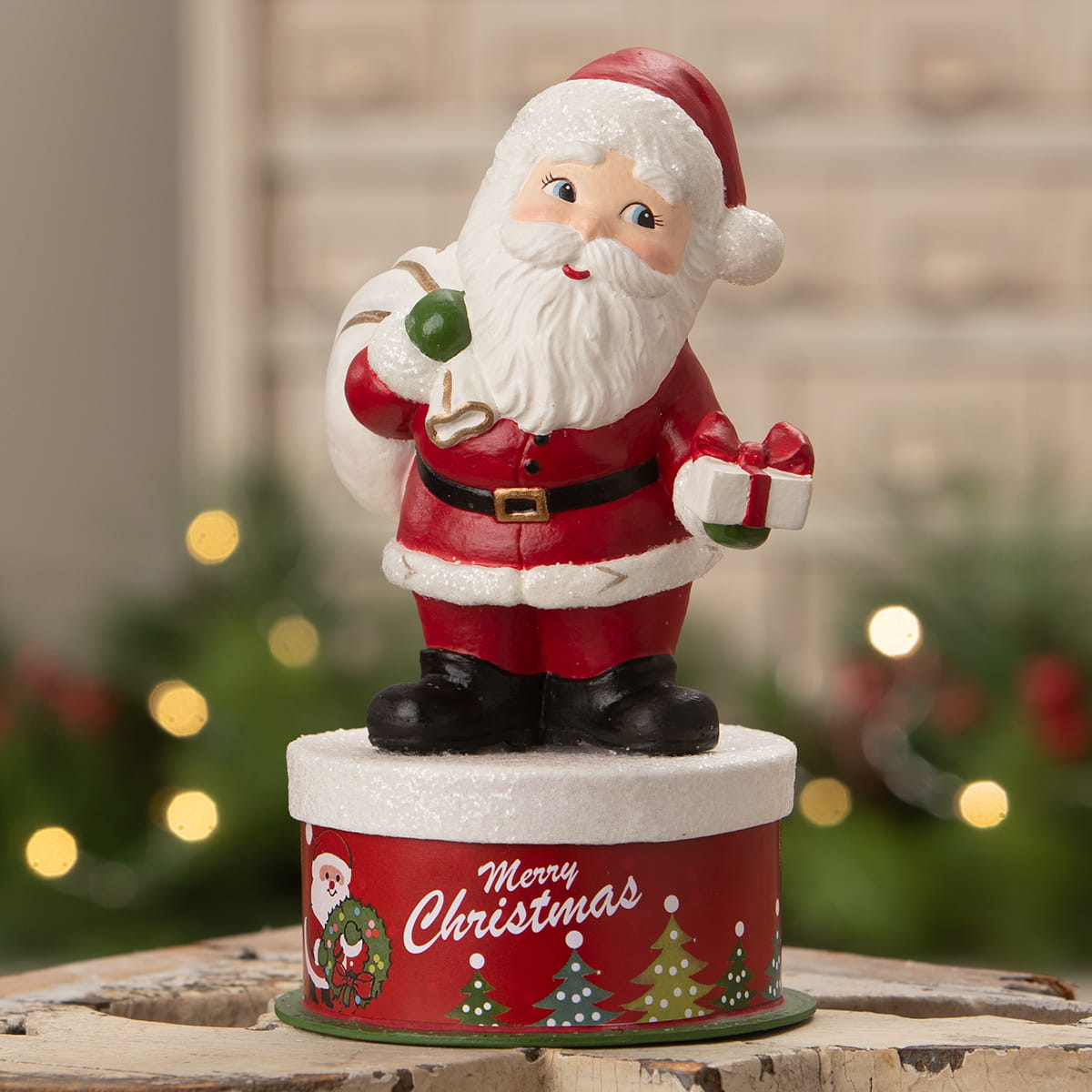 Retro santa red and white bethany lowe design santa figure on merry christmas themed festive cylindrical base