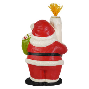 Retro santa bethany lowe design red and white glittery santa figurine holding green gift sack and white candle flame