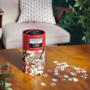 Red cylindrical retro snowmen puzzle box with festive snowy friends design in red green white and beige colors