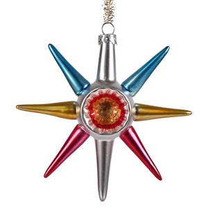 Retro yesteryear star glass ornament with tinsel indent, vibrant blue gold red arms, and silver metallic center