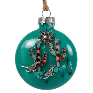 Teal glass roadrunner and cactus ornament features colorful desert cacti with silver tones and turquoise inlay accents