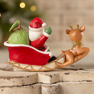 Red and white santa figure from bethany lowe designs rocking santa in sleigh pulled by brown reindeer with glitter antlers