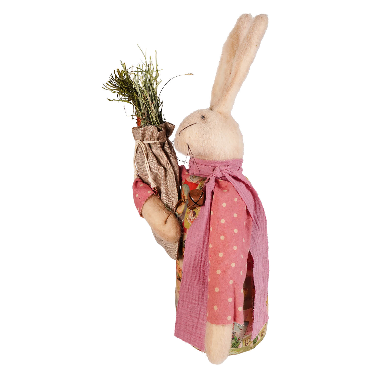 Rosamund rabbit is a cream felt figurine with a pink polka-dot apron holding a burlap sack with green grass