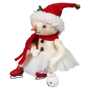 A charming rosemary flake christmas snowman figure by bethany lowe designs wearing a red santa hat and white tulle skirt