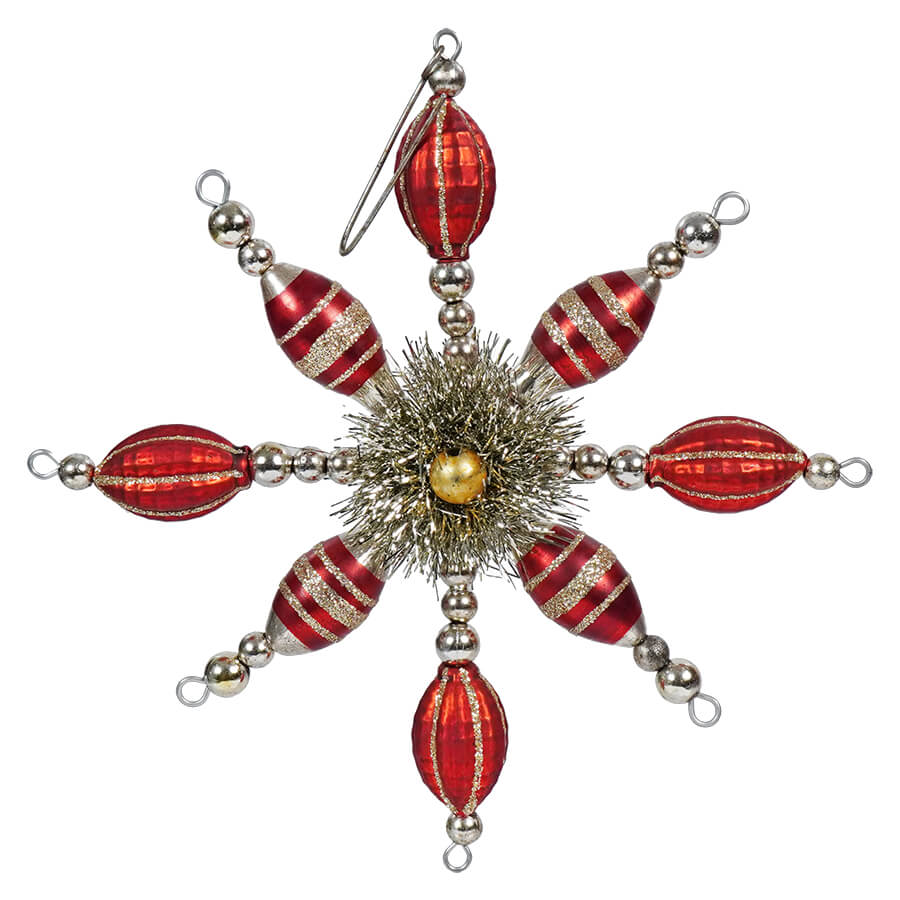 Ornate red and silver snowflake-shaped Christmas ornament with beaded arms.