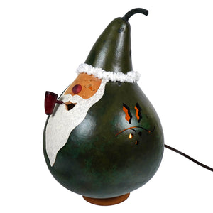 Dark green lighted santa gourd with painted santa face by meadowbrooke gourds perfect for holiday decor