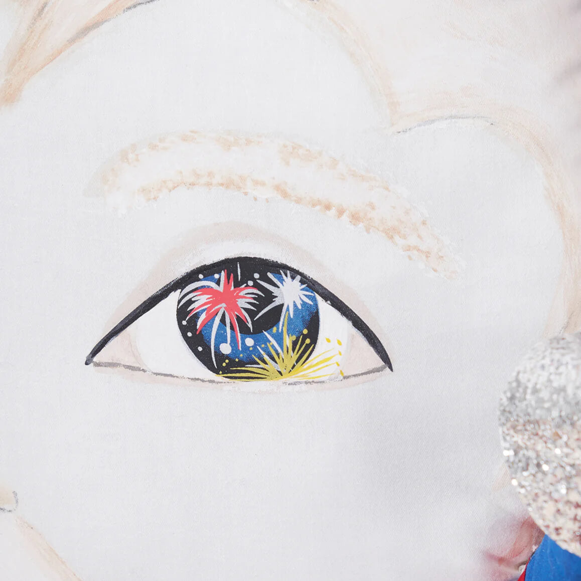 A sammy baby zombinaland decorative pillow with a vibrant hand-painted eye and fireworks by tracy scheff perfect for holiday pillows