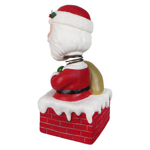 Red and white santa claus bobble head with textured beard wearing classic suit and holly sitting on brick chimney by bethany lowe designs