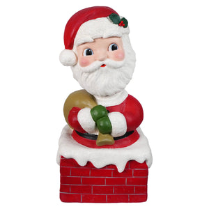 Red and white santa claus bobble head figurine from bethany lowe designs holding gifts on brick chimney santa figures