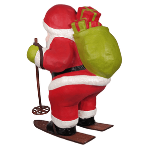 Bethany lowe designs santa delivery on skis figurine with red white coat glitter trim carrying green sack of gifts skiing wooden skis