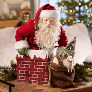 Red and white santa down the chimney figurine with fluffy beard and faux snow from bethany lowe designs santa figures