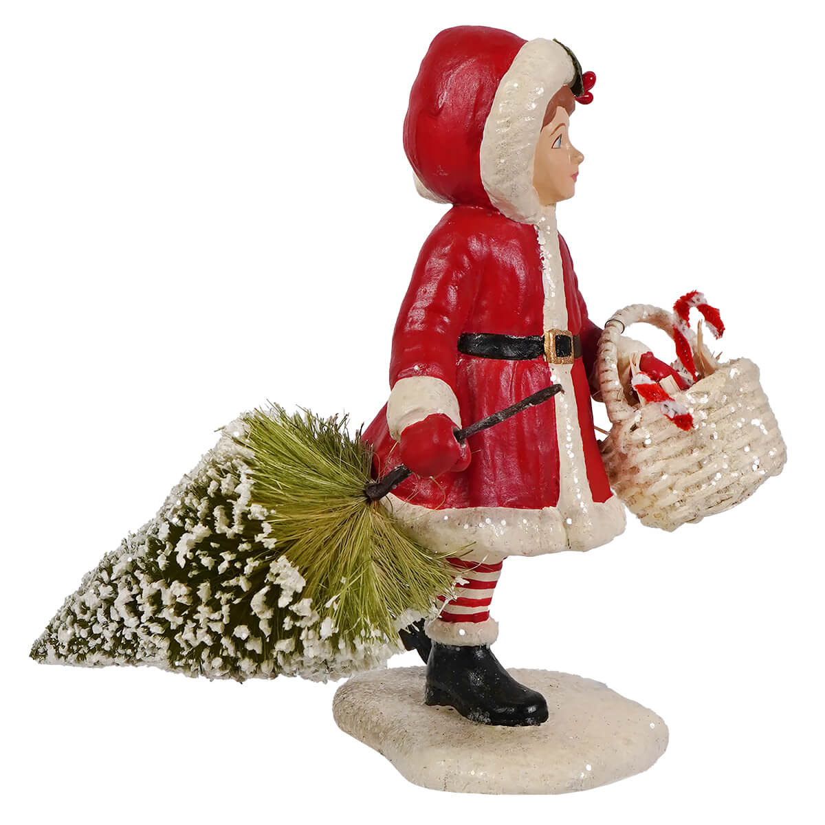 Santa girl pulling tree figurine by bethany lowe designs features a red white coat child carrying tree and candy canes