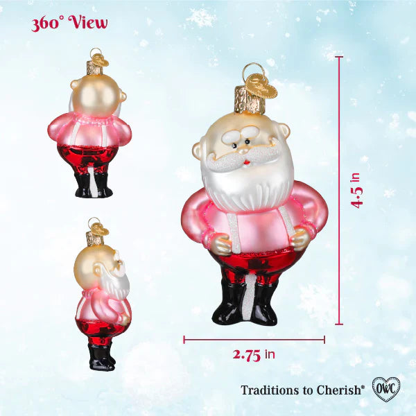 A charming christmas glass ornament santa in suspenders with pink red coat white beard and gold trim hat