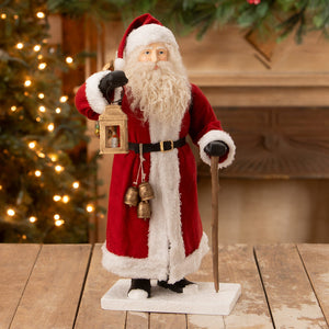 Santa lights the way red and white santa figure with long white beard holding lantern and cane by Bethany Lowe Designs