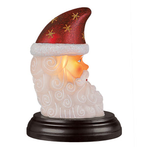 Red glittery hat with gold stars and white fur trim on a swirling bearded santa moon face light christmas lighted glass decor