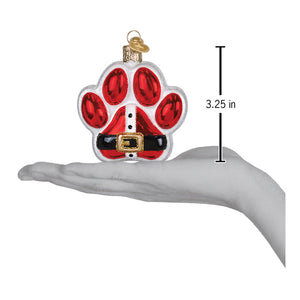 Red and white glass santa paws ornament shaped like a paw print with black belt and gold buckle figural decor