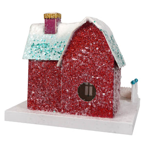 A cody foster santa ranch village house christmas house with a red glitter birdhouse and snow dusted teal roof