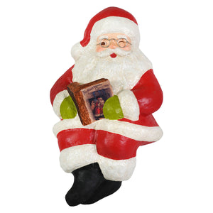 Red and white textured bethany lowe design santa shelf sitter figurine holding a book perfect for folk art santas display