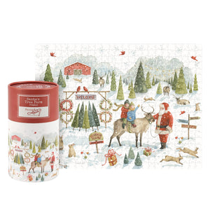A festive red and white cylindrical tree farm puzzle by kathy featuring santa and kids on reindeer in a snowy forest scene