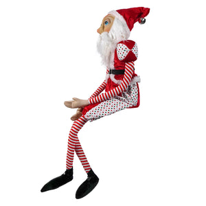 A festive red and white striped stuffed fabric santa elf figurine with polka dotted vest spreading holiday cheer by joe spencer