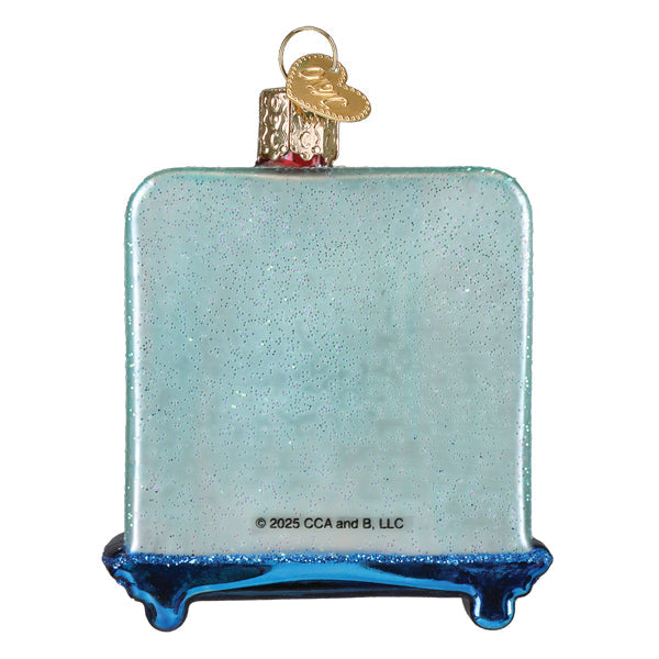 A light blue glittery glass scout elf storytime ornament shaped like a vintage perfume bottle with gold accents