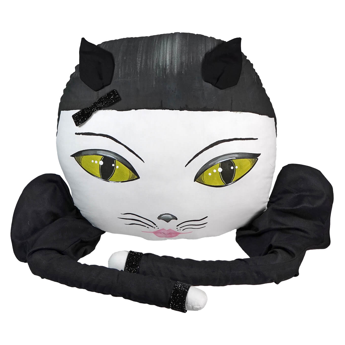 Stylized cat-shaped pillow or plush toy with large yellow eyes and black accents.