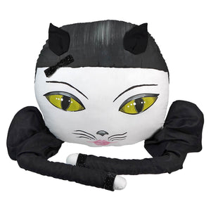 Stylized cat-shaped pillow or plush toy with large yellow eyes and black accents.