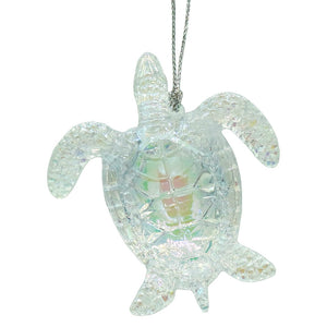 Clear iridescent glass sea turtle ornament with faceted surface and silver chain perfect as pink sparkle scallop shell decor
