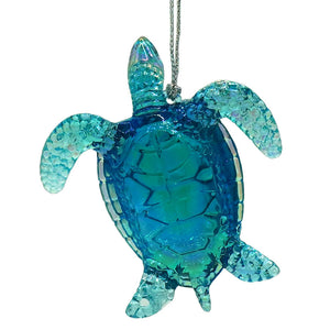 Translucent blue and teal glass sea turtle ornament with textured faceted surface perfect for sparkle scallop shell decor
