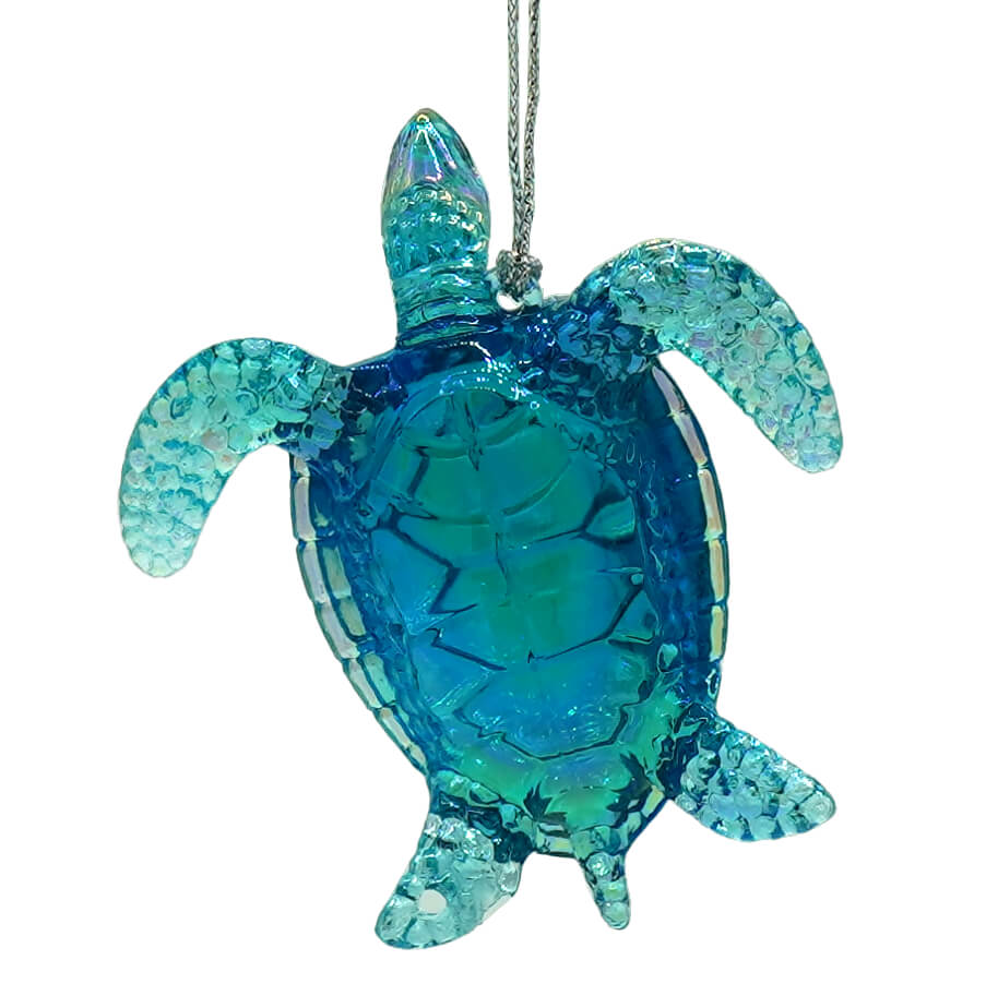 Translucent blue and teal glass sea turtle ornament with textured faceted surface perfect for sparkle scallop shell decor
