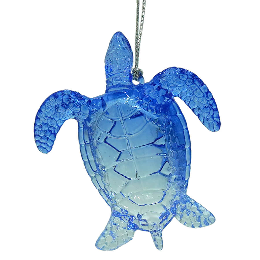 Blue translucent glass sea turtle ornament with textured shell and flippers perfect with sparkle scallop shell decor