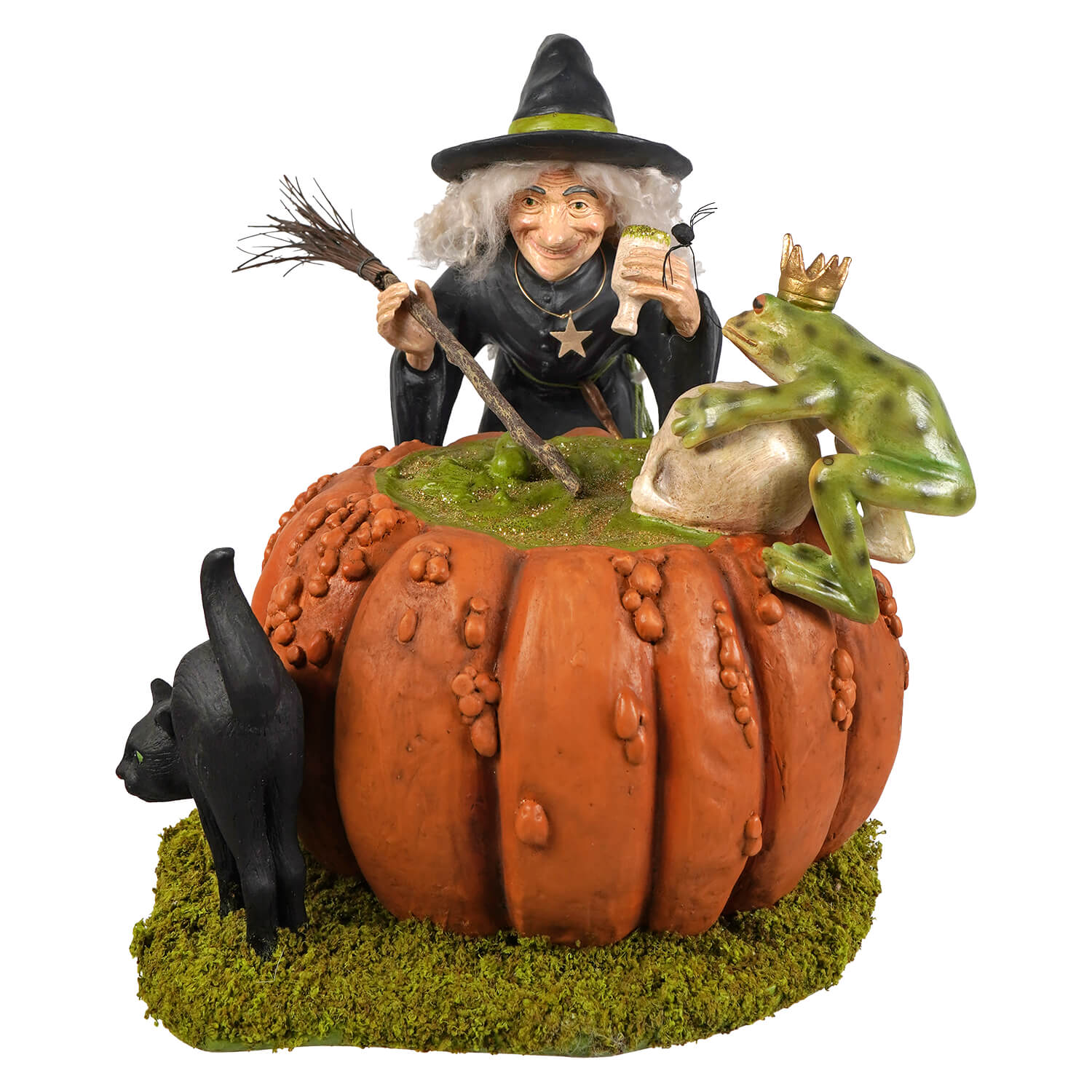 A whimsical halloween witches figurine with a witch, black cat, and crowned frog on a pumpkin for selene’s prince potion
