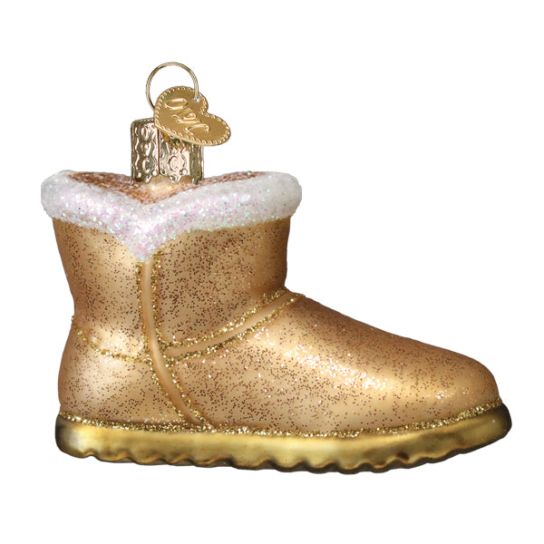 Gold glittery sheepskin boot ornament with white fuzzy trim and heart tag perfect as santa boot ornament or figural decor