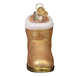 Golden glittery sheepskin boot ornament with white fuzzy trim and heart tag perfect as santa boot ornament or figural decor