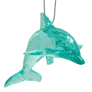 A shimmering dolphin ornament in translucent turquoise glass with sparkle scallop shell inspired speckles
