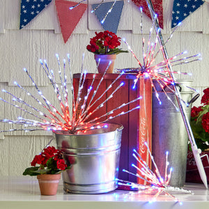 Light-up starburst decorations with red, white and blue LED lights in metallic containers.