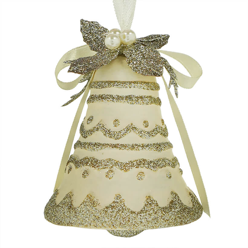 Ornate bell-shaped Christmas ornament with glittery gold patterns on a cream background.