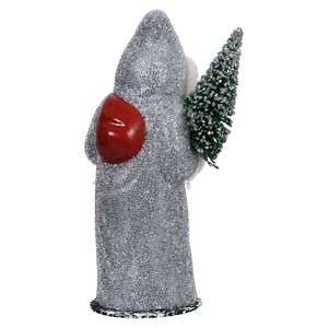 Silver santa glittery angel figurine with red chest detail holding green frosted christmas tree ino schaller white