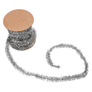 Silver tinsel garland on spool showing shiny metallic strands perfect for gold and silver theme holiday garlands