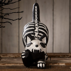 Black and white skeleton paper mache cat figurine with painted bone details perfect for halloween cats skeleton decor
