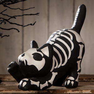 Black and white skeleton paper mache cat figurine with painted bone patterns perfect for halloween cats and skeleton decor