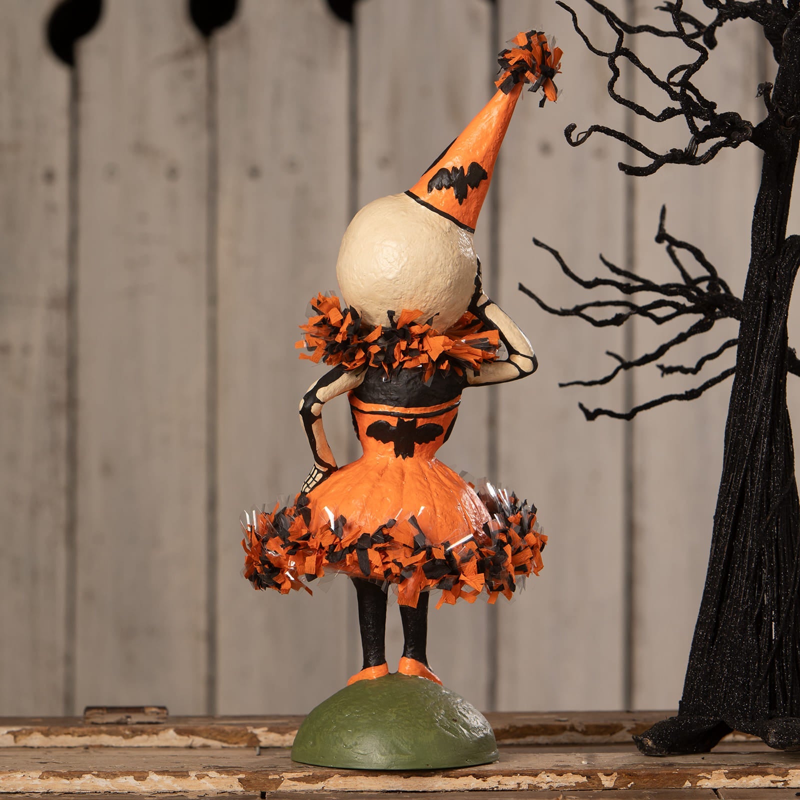Skelita skellington skeleton decor figure with pumpkin head bat-patterned dress and fringed tulle skirt by bethany lowe