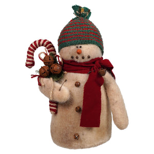 Beige felt skicap snowman holding candy cane wearing red and green striped hat and red scarf with gold bells spreading holiday cheer