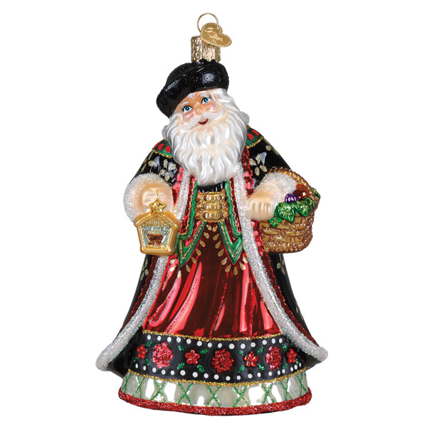 Glass slovak father christmas ornament showing santa in black and red robe with gold trim holding lantern and basket