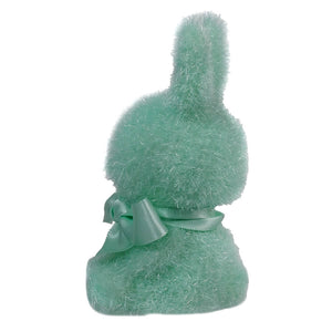 Mint green fuzzy bunny-shaped decorative figure with a bow.