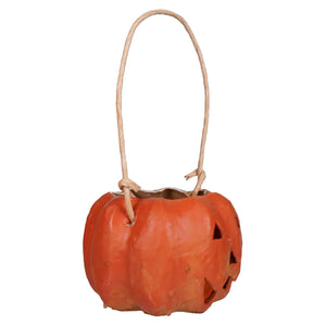 Small carved orange pumpkin bucket with raggedy junction design and natural twine handle handcrafted folk art lantern