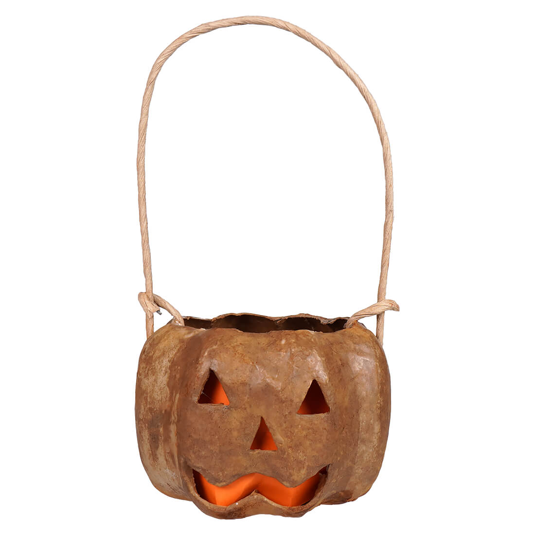 Small carved tan pumpkin bucket with rustic handcrafted folk art design and woven rope handle glowing orange inside