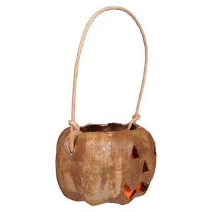 Small carved tan pumpkin bucket with raggedy junction design handcrafted folk art and natural fiber handle