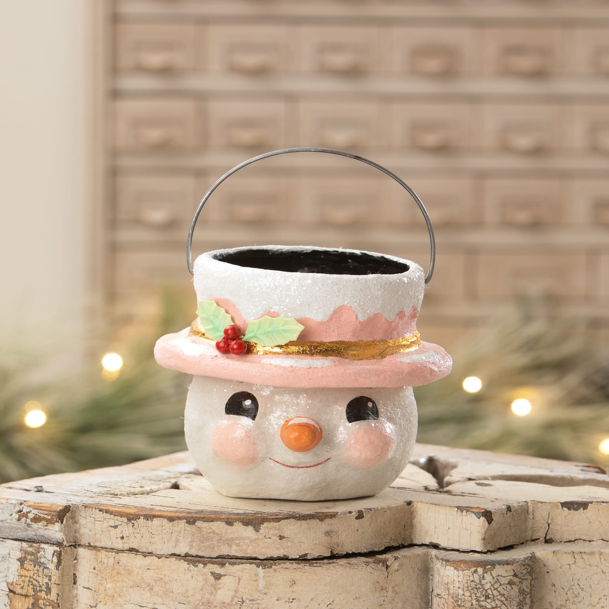Small pastel holly hat snowman planter by bethany lowe designs with pink hat holly trim and silver wire handle christmas snowman decor